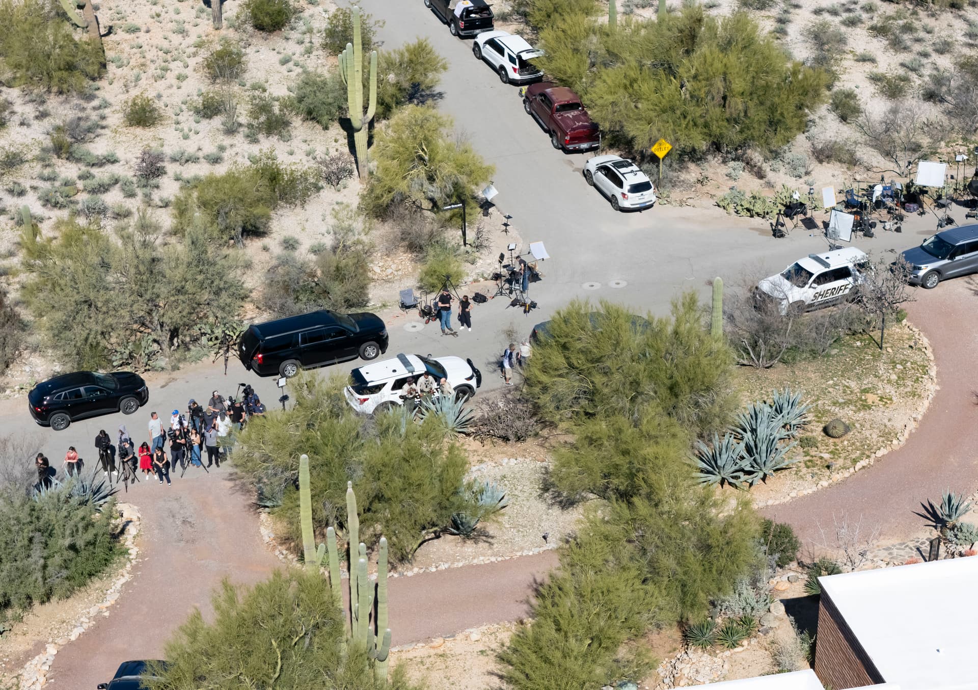 In an aerial view, media are stationed outside the home of Nancy Guthrie as authorities continue to investigate on February 8, 2026 in Tucson, Arizona.  