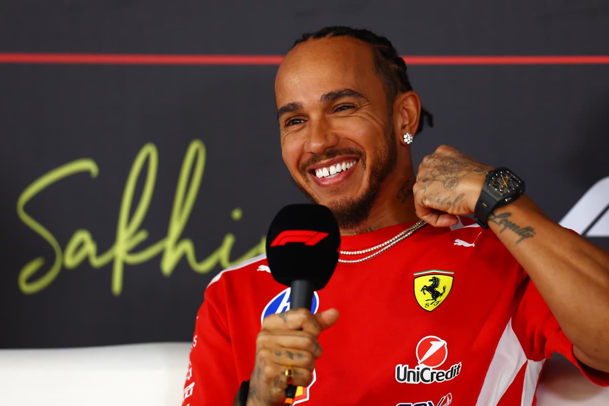 Lewis Hamilton of Great Britain talks in the Drivers Press Conference during day one of F1 Testing at Bahrain International Circuit on February 18, 2026 in Bahrain.