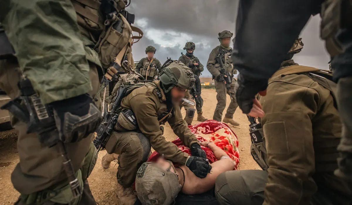 IDF soldiers rescue an unidentified man in Gaza.