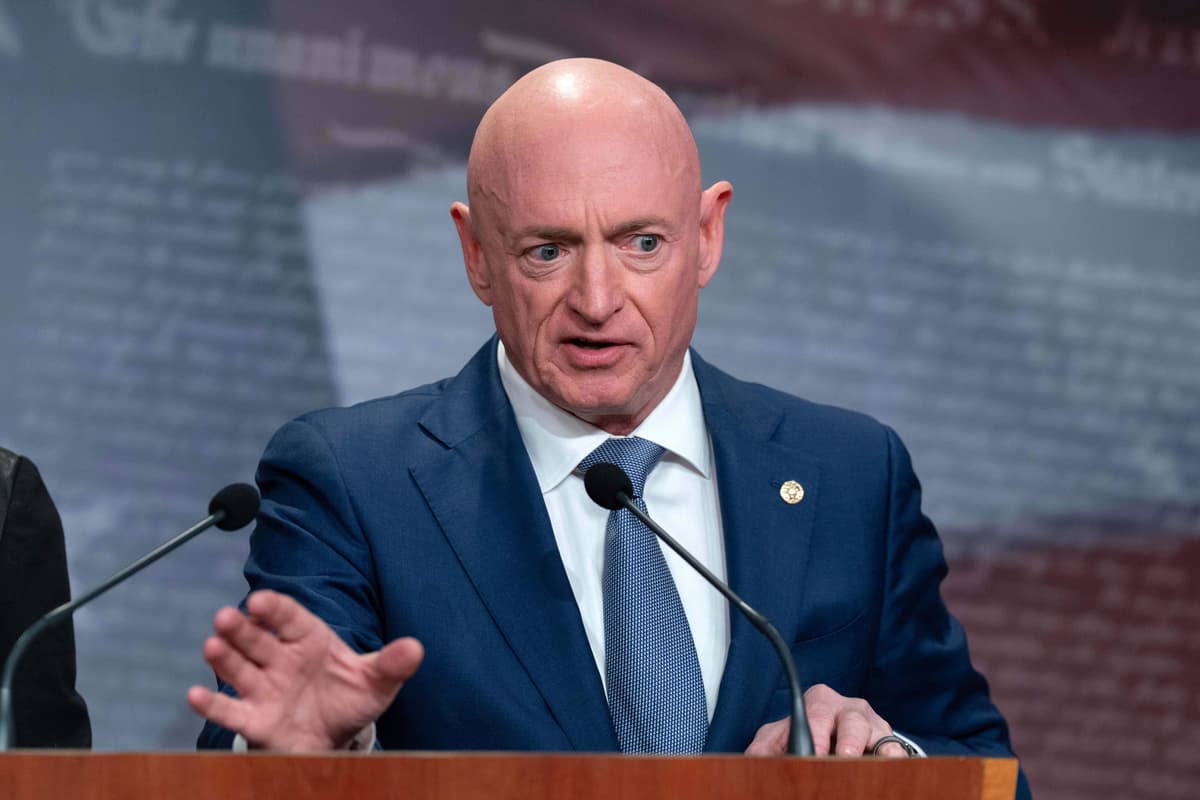 Senator Mark Kelly speaks during a news conference at Capitol Hill on February 11, 2026.