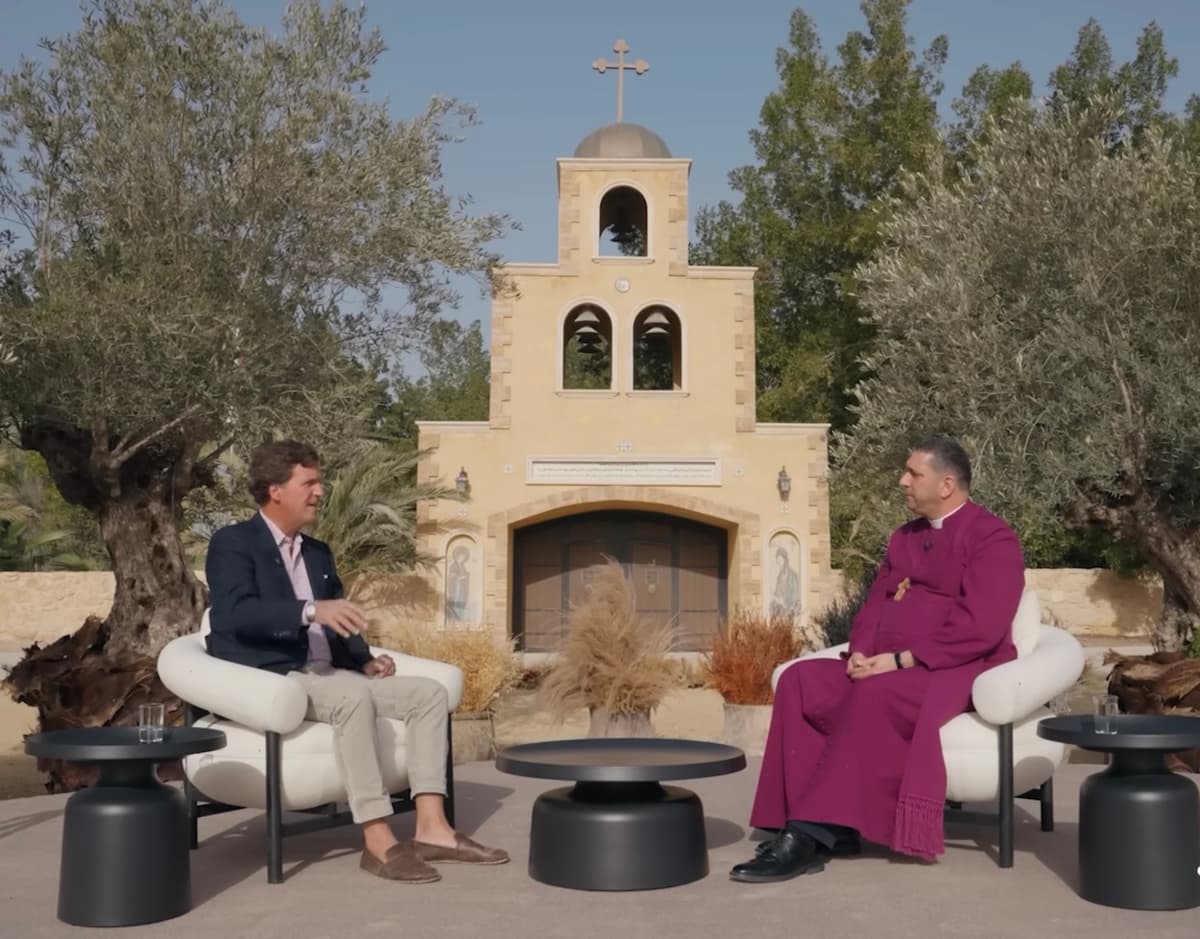 Tucker Carlson with the Anglican Archbishop of Jerusalem, Hosam Naoum, in the Jordan Valley.