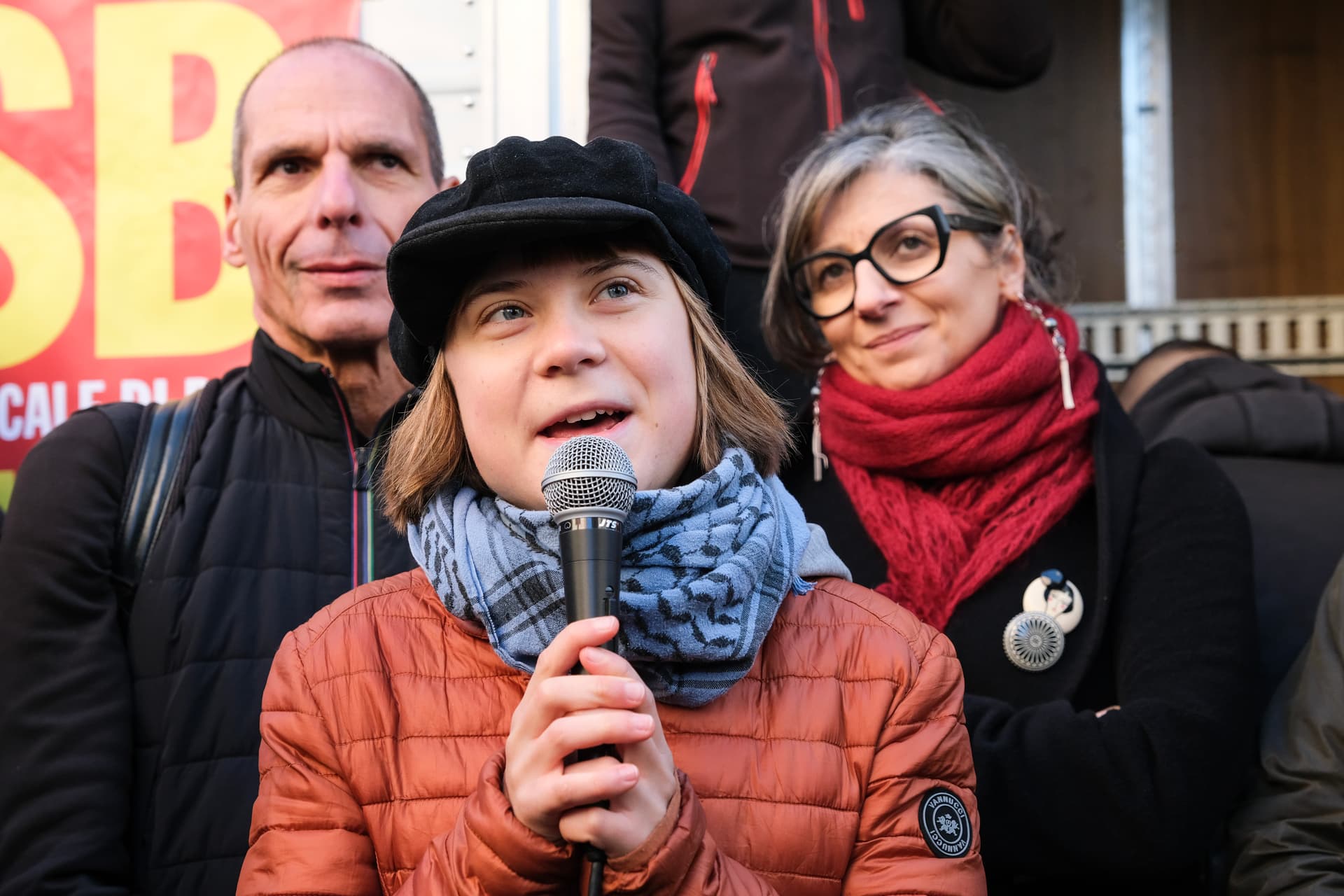 Yanis Varoufakis (L), Greta Thunberg (C) and Francesca Albanese (R) attend a protest against Italy's defense funding on November 28, 2025.