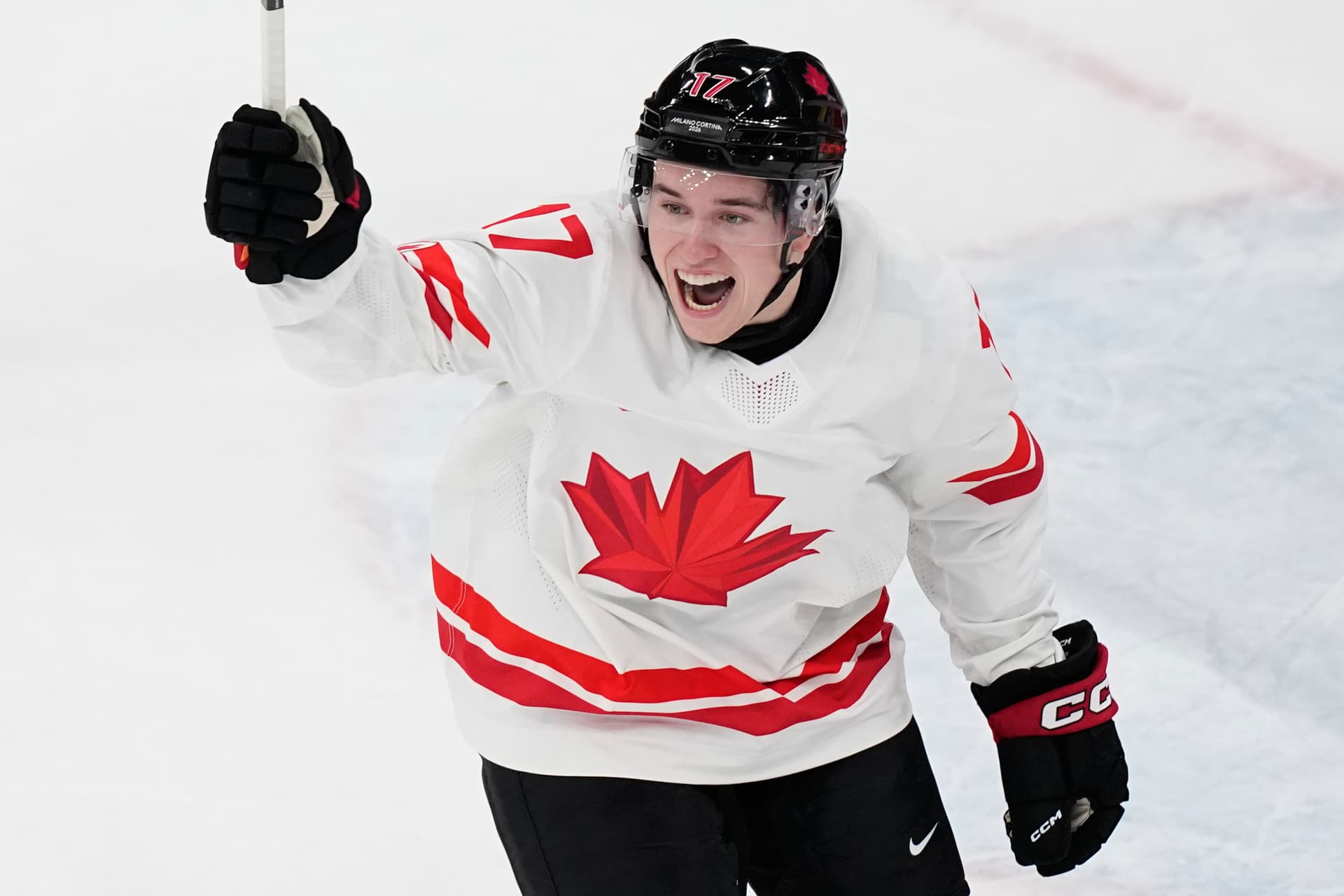 Canada's Macklin Celebrini celebrates after scoring his sides first goal during a preliminary round match of men's ice hockey between Czech Republic and Canada at the 2026 Winter Olympics.