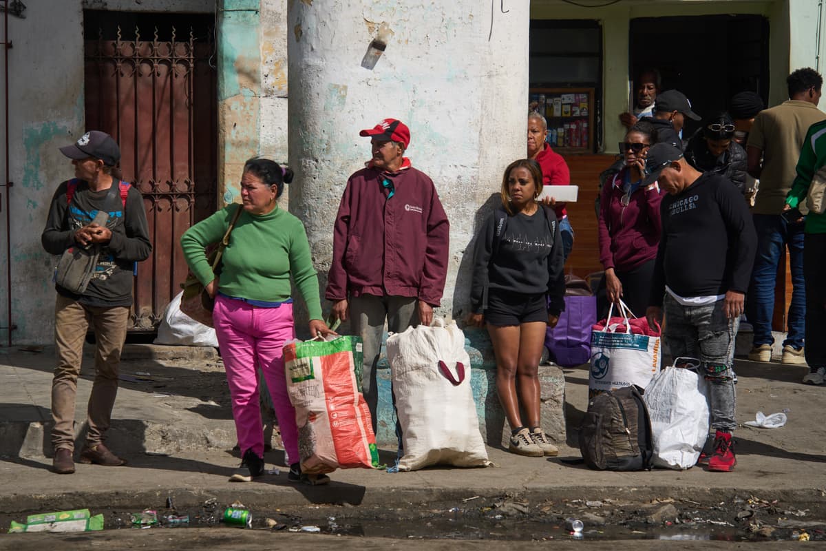 People wait to board transportation at Havana, Cuba, February 6, 2026.