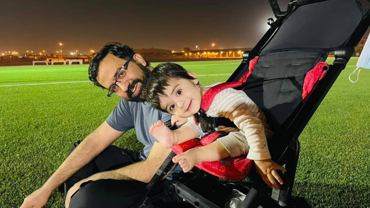 Mahmood Habibi and his daughter in Qatar in June 2022, shortly before he was taken by the Taliban.