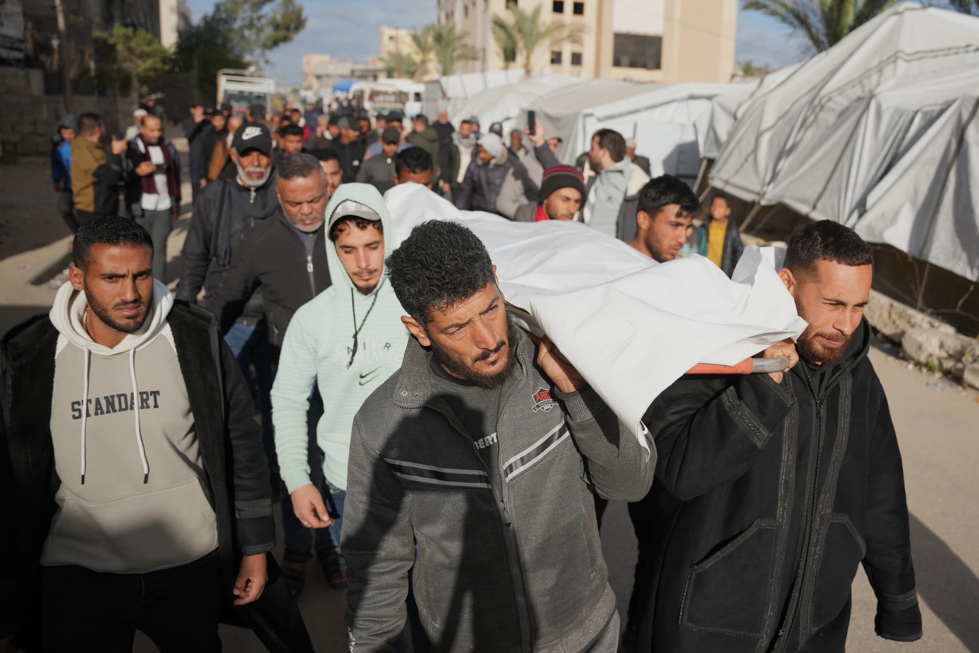 Palestinians carry the body of a man who was killed in an Israeli military strike, during his funeral at Nasser Hospital at Khan Younis, February 4, 2026. 