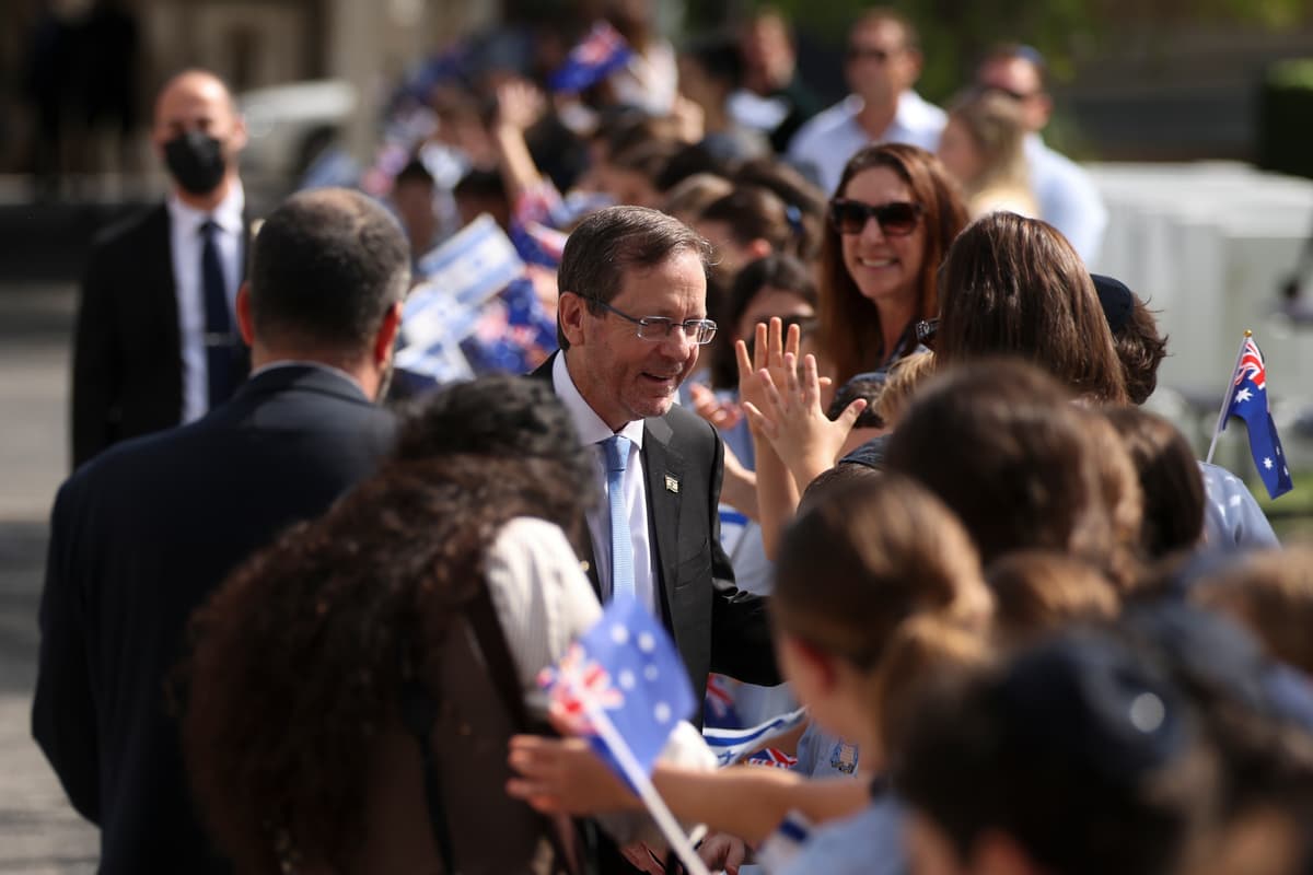 Israeli President Isaac Herzog, center, meets students at Moriah War Memorial College at Sydney, February 10, 2026.