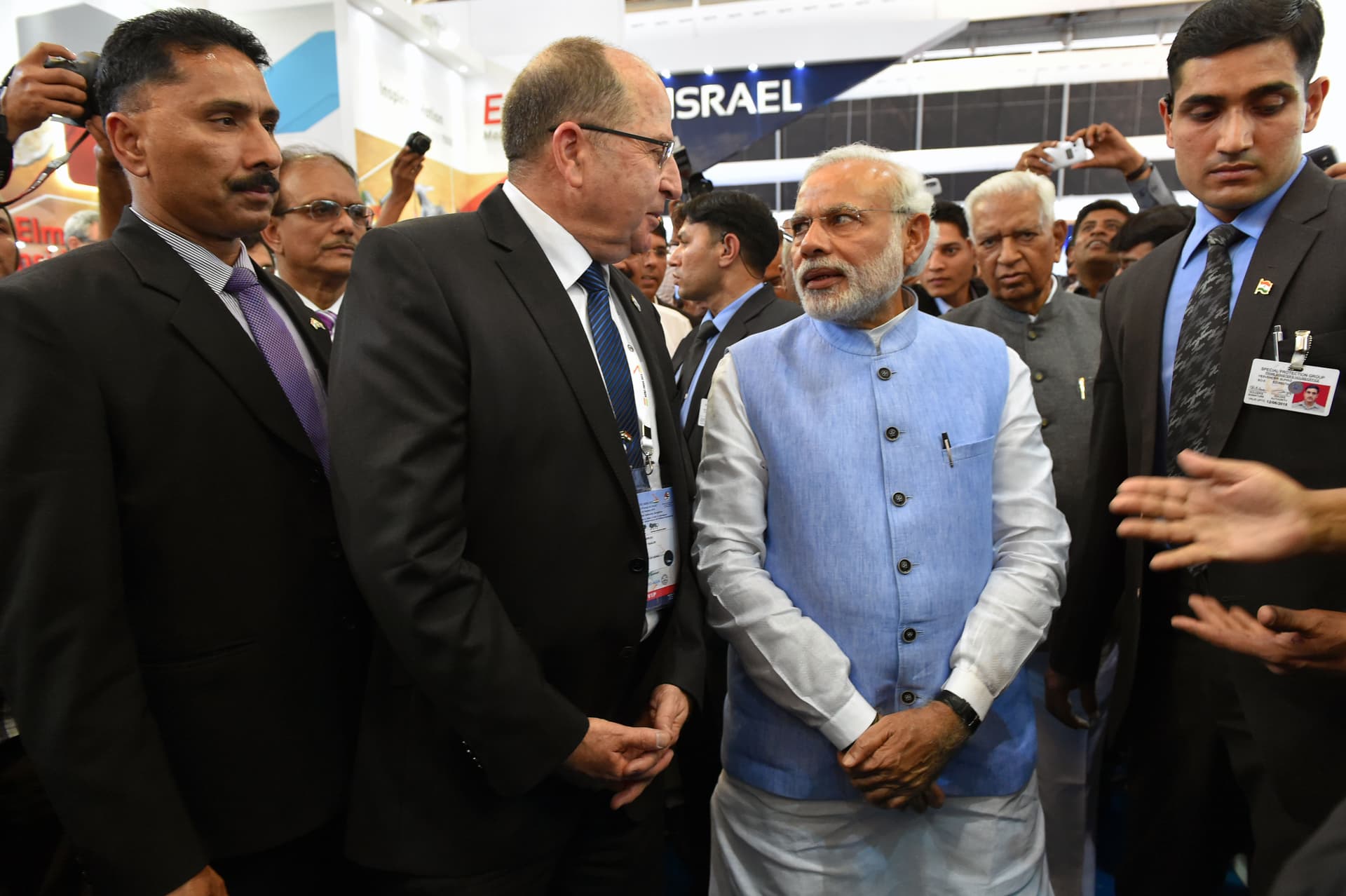 Israel's defense minister, Moshe Ya'alon, visits  with Prime Minister Narendra Modi in 2015 at Bangalore, India.  
