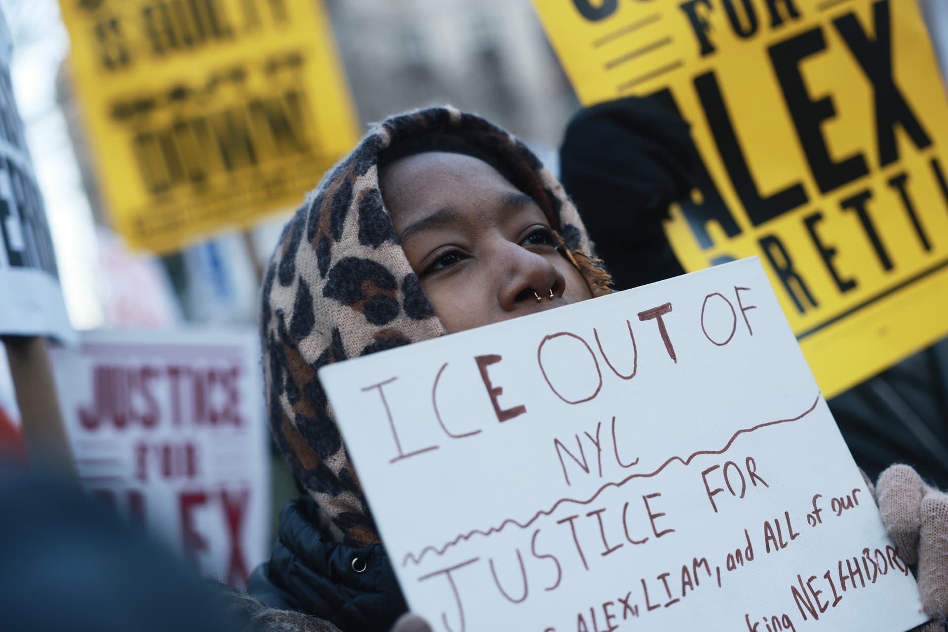 Hundreds of people, including students, attend a rally in lower Manhattan as part of a 'National Shutdown' event against ICE.