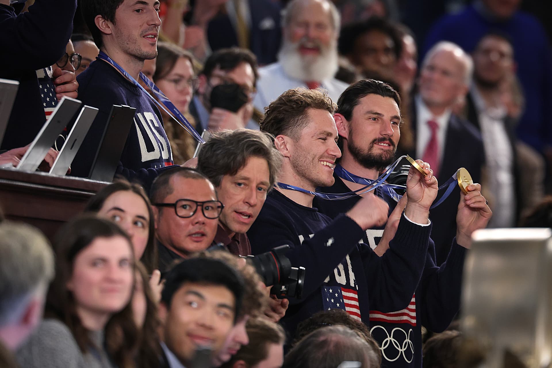 Members of the Team USA Men's Hockey Team wave to the audience as U.S. President Donald Trump delivers his State of the Union address during a Joint Session of Congress at the U.S. Capitol on February 24, 2026, in Washington, D.C. 