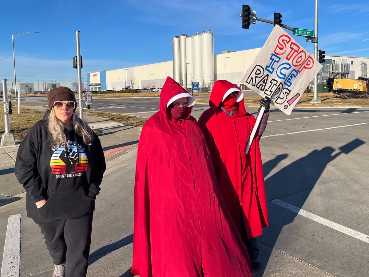 Protesters outside a warehouse federal officials are touring to consider repurposing for an ICE detention facility, in Kansas City, Missouri.