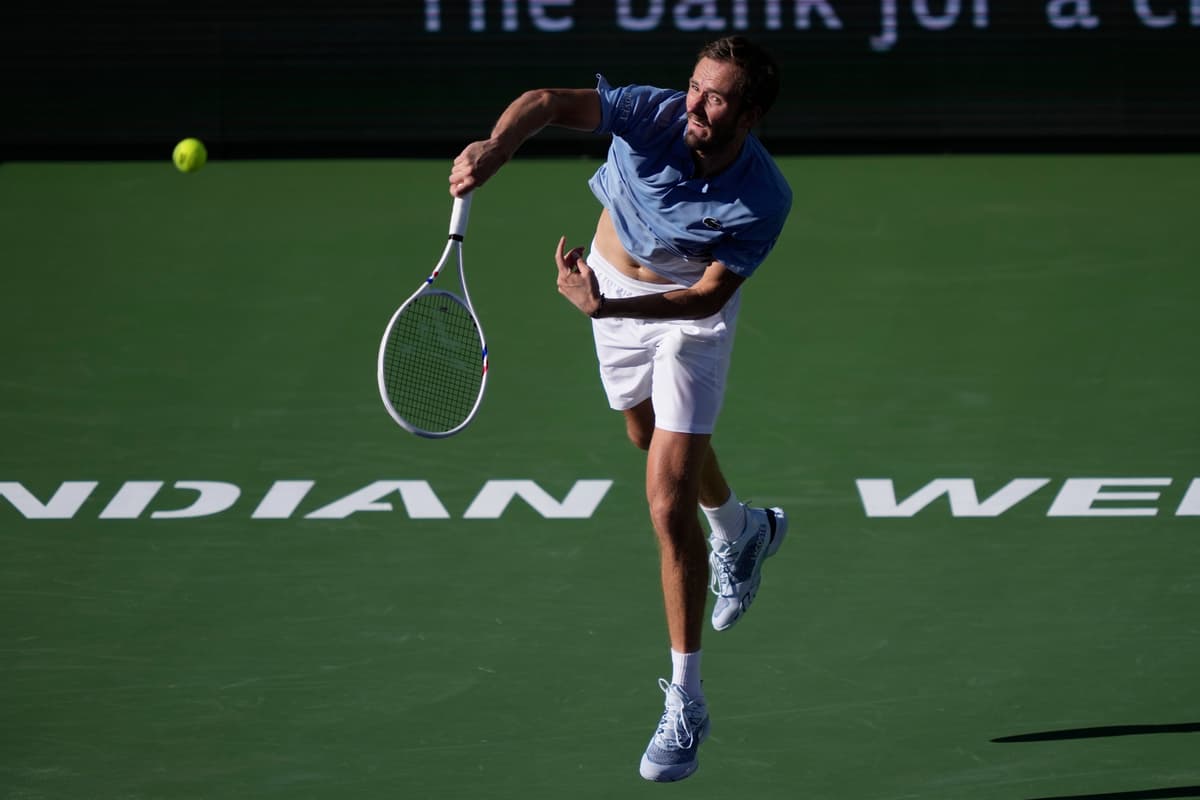 Daniil Medvedev of Russia serves against Carlos Alcaraz of Spain during a semifinal match at the BNP Paribas Open tennis tournament at Indian Wells, California, on March 14, 2026.
