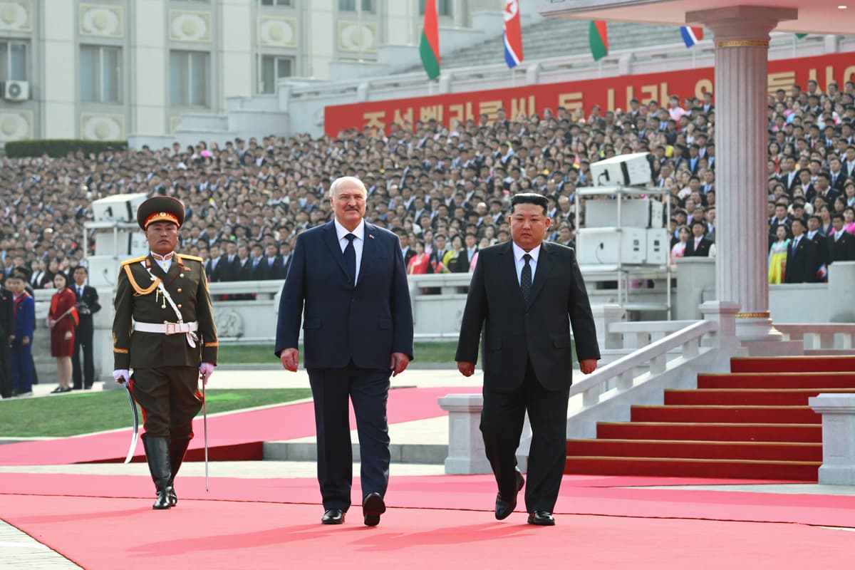 North Korea's leader, Kim Jong Un, and Belarusian President Alexander Lukashenko attend an official meeting ceremony at Pyongyang on March 25, 2026.