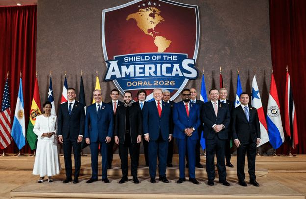 President Trump poses with 12 Latin American leaders at the inaugural Shield of the Americas summit at Miami on March 7, 2026.