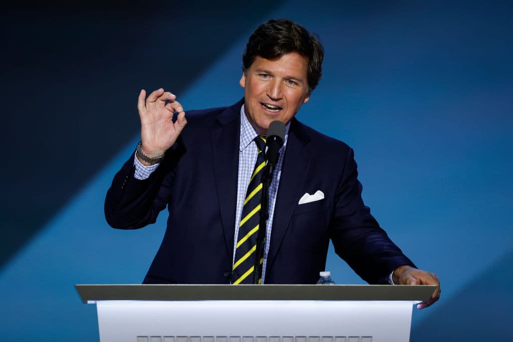 Tucker Carlson speaks on stage on the fourth day of the Republican National Convention at the Fiserv Forum on July 18, 2024 at Milwaukee. 