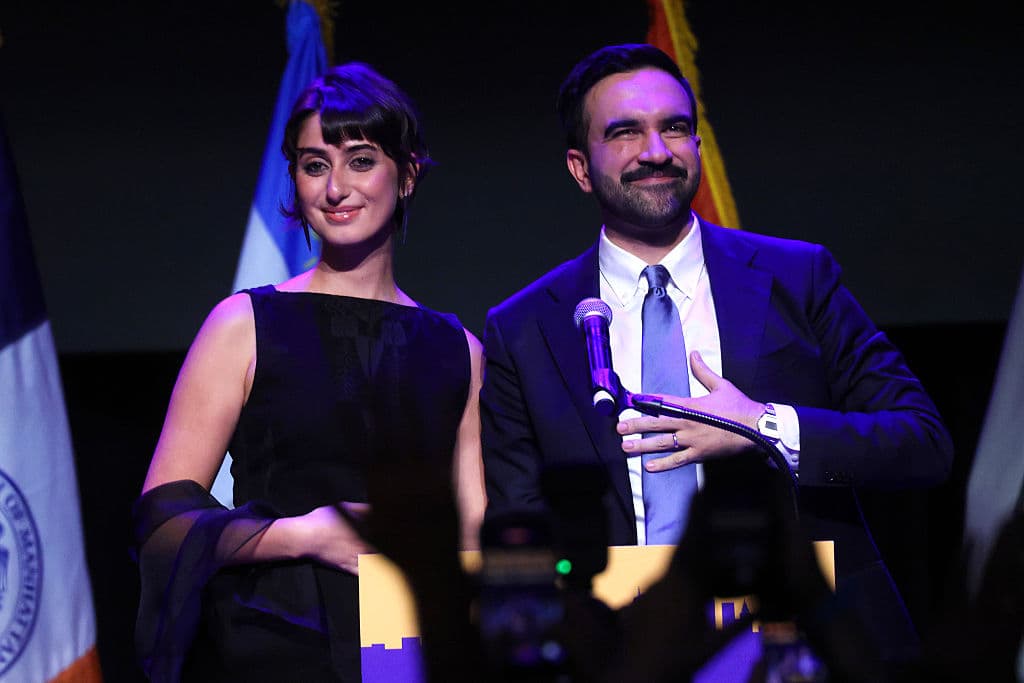 Mayor Zohran Mamdani stands with his wife Rama Duwaji after delivering remarks at the Brooklyn Paramount on November 4, 2025. 