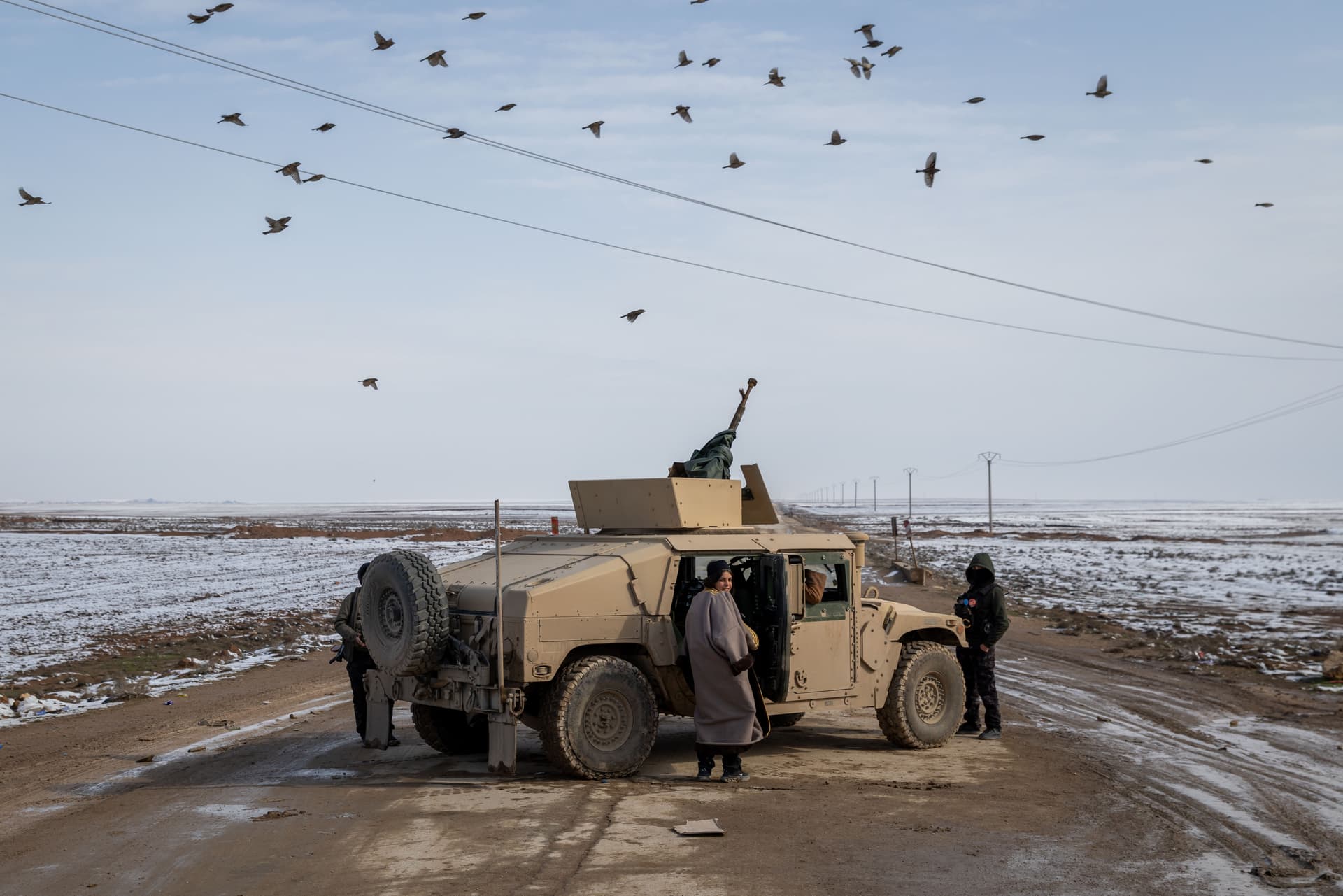 YPG fighters operate near a frontline position January 24, 2026 in Al Hasakah, Syria.  