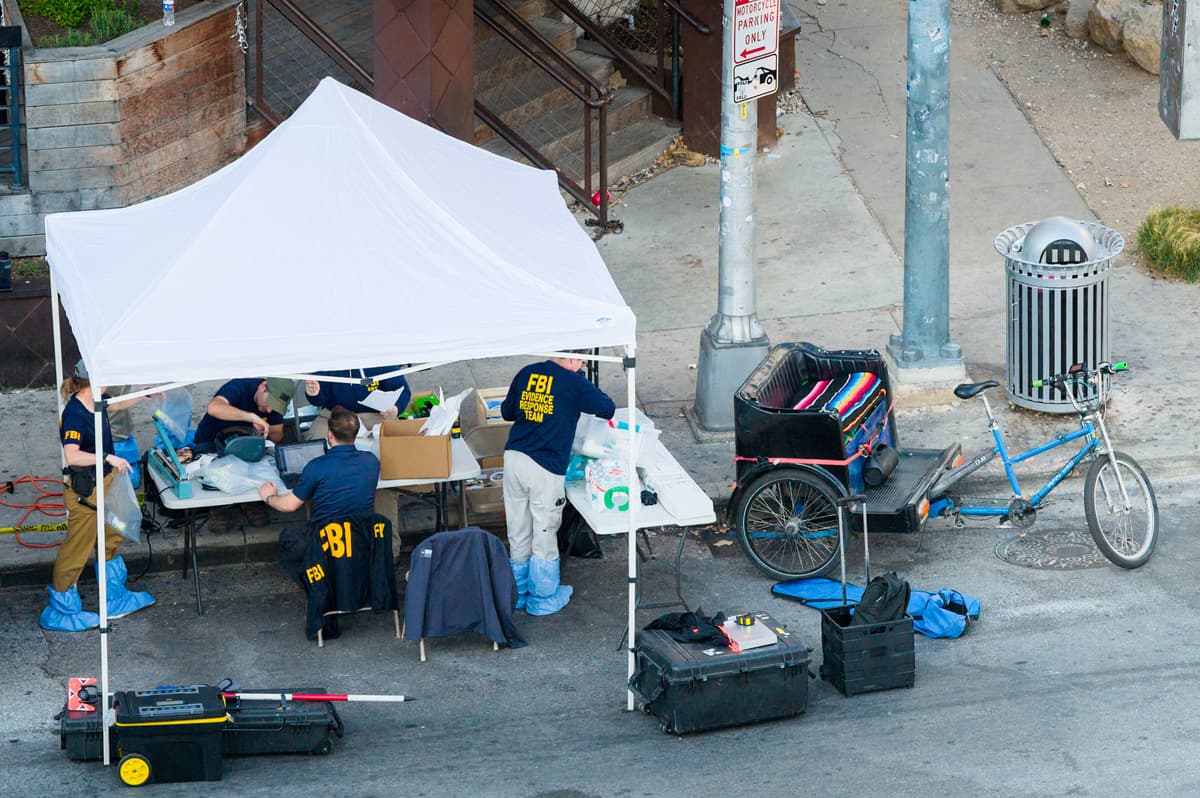 Members of the FBI conduct an investigation near Buford's bar in downtown on March 01, 2026 in Austin, Texas. Three people are dead and 14 others hospitalized following a mass shooting early Sunday morning.   