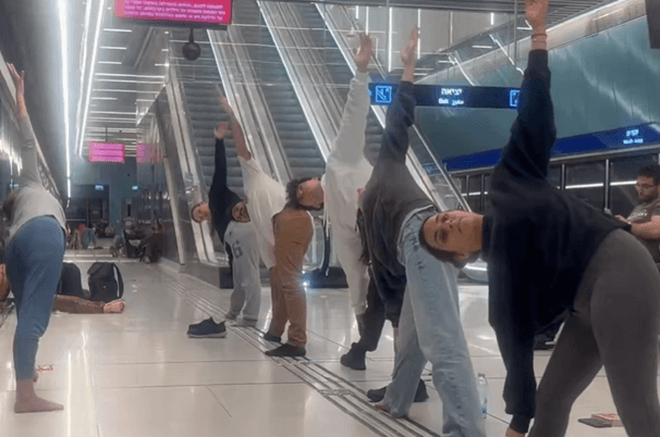 Tel Aviv residents perform yoga exercises at a bomb shelter on February 28, 2026. 