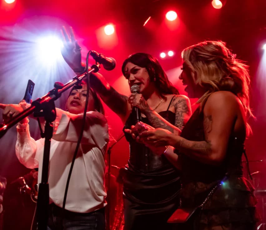 Trish Toledo (center) and band.