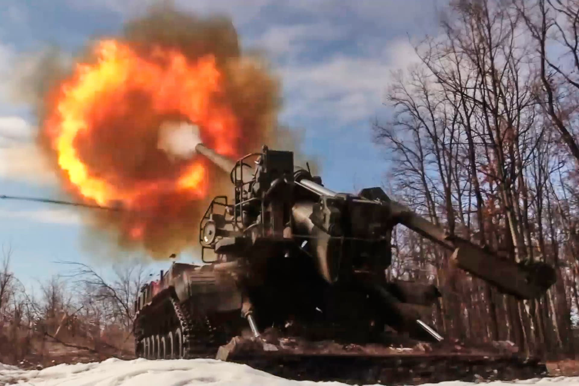 A Russian Pion self-propelled 203 mm cannon fires towards a Ukrainian position on March 23, 2026.
