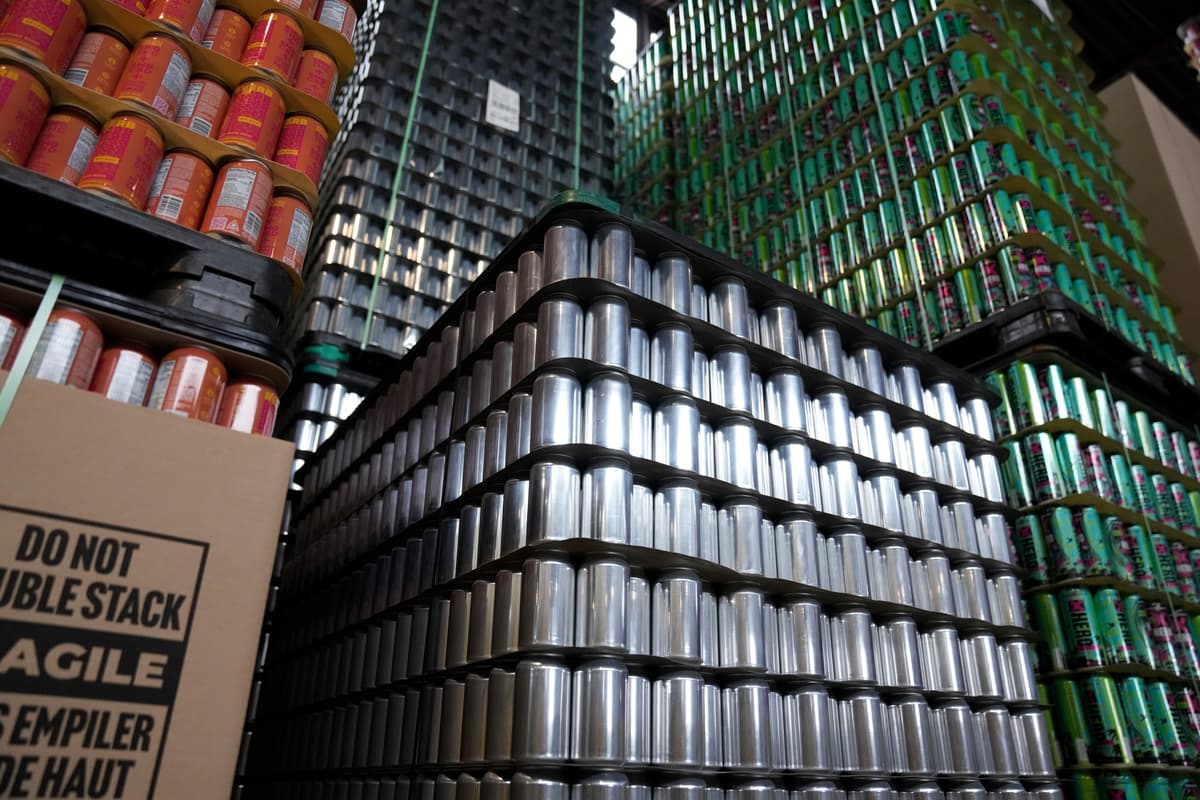 Empty aluminum cans are stacked at Revolution Brewing, Friday, Feb. 20, 2026, in Chicago.