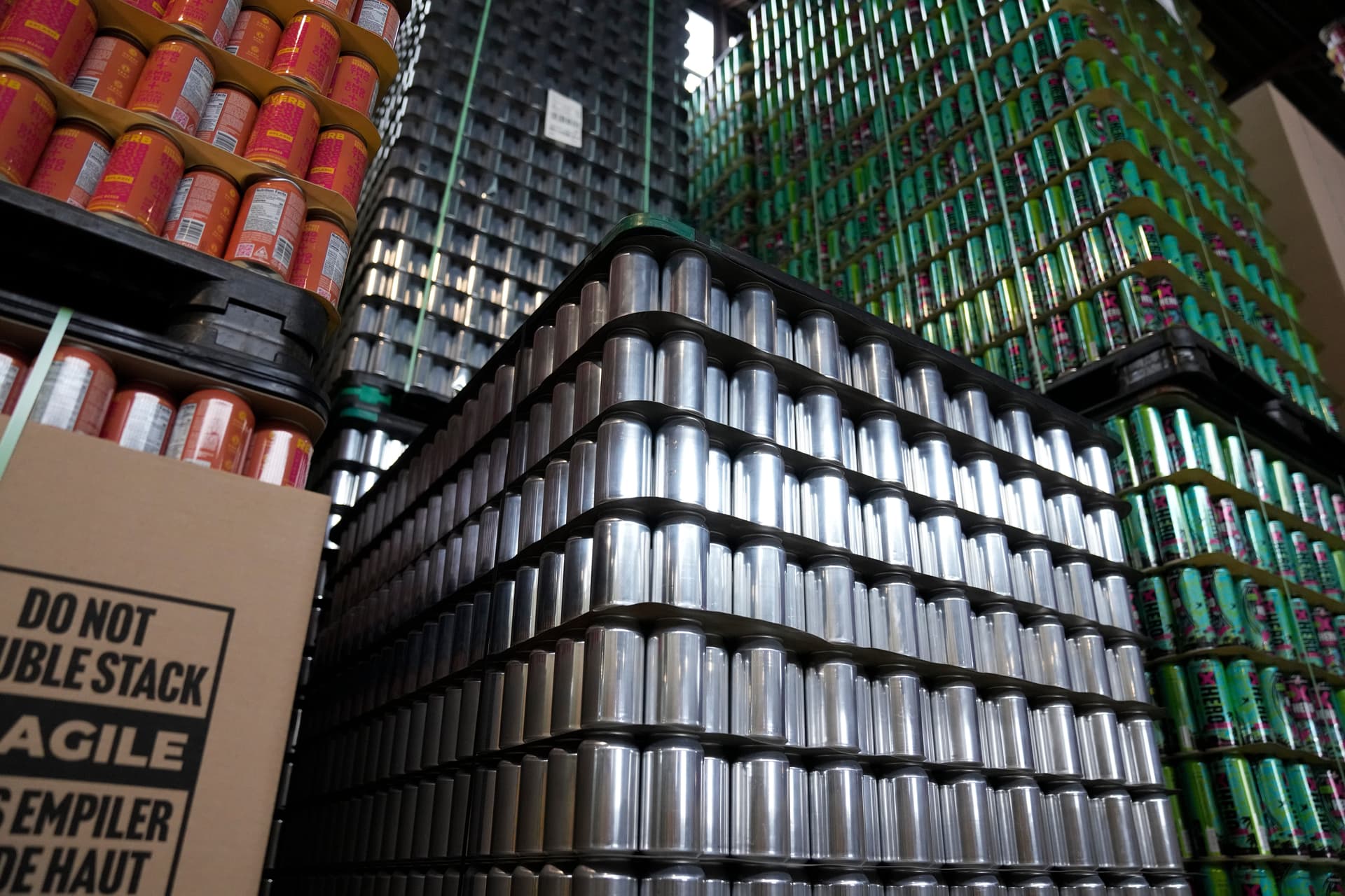 Empty aluminum cans are stacked at Revolution Brewing, Friday, Feb. 20, 2026, in Chicago.