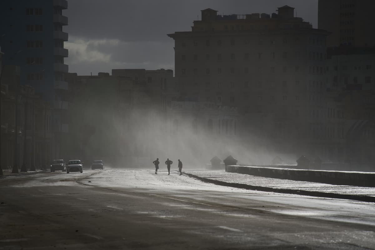 People walk along the Malecón at Havana, February 23, 2026.
