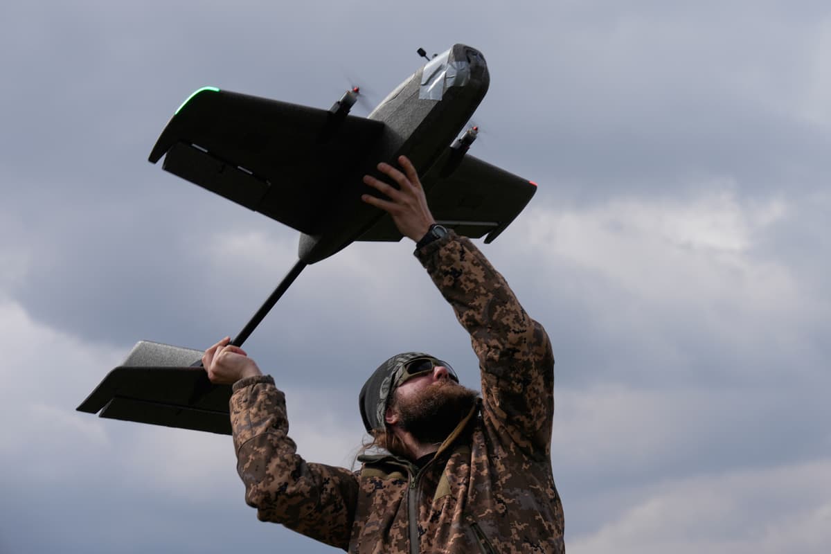 A student soldier of the Yatagan School for Unmanned Aerial Systems launches a training target drone during drills near Kyiv, Ukraine, March 19, 2026.