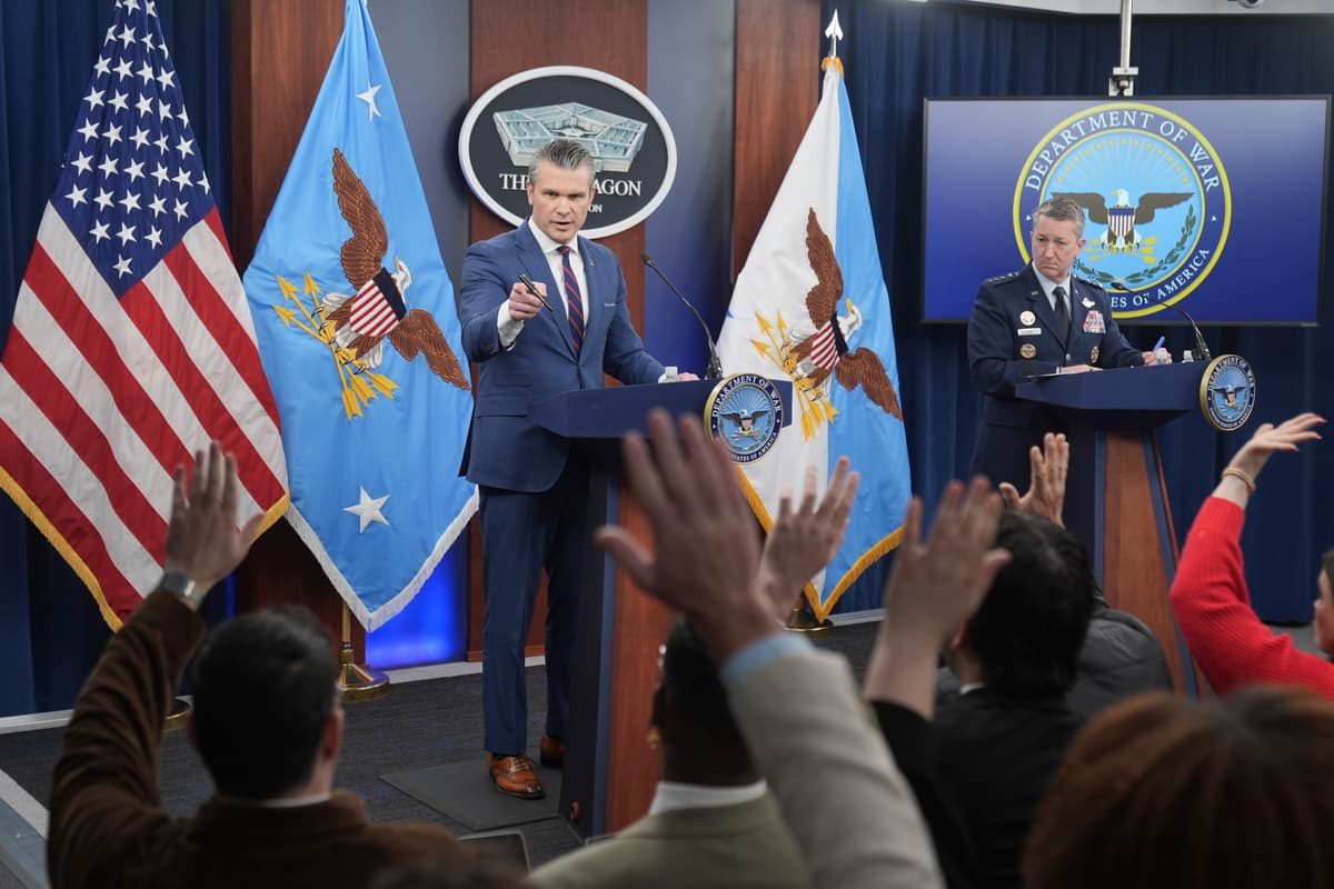 Defense Secretary Pete Hegseth and Chairman of the Joint Chiefs of Staff General Dan Caine take questions during a press briefing at the Pentagon, Monday.
