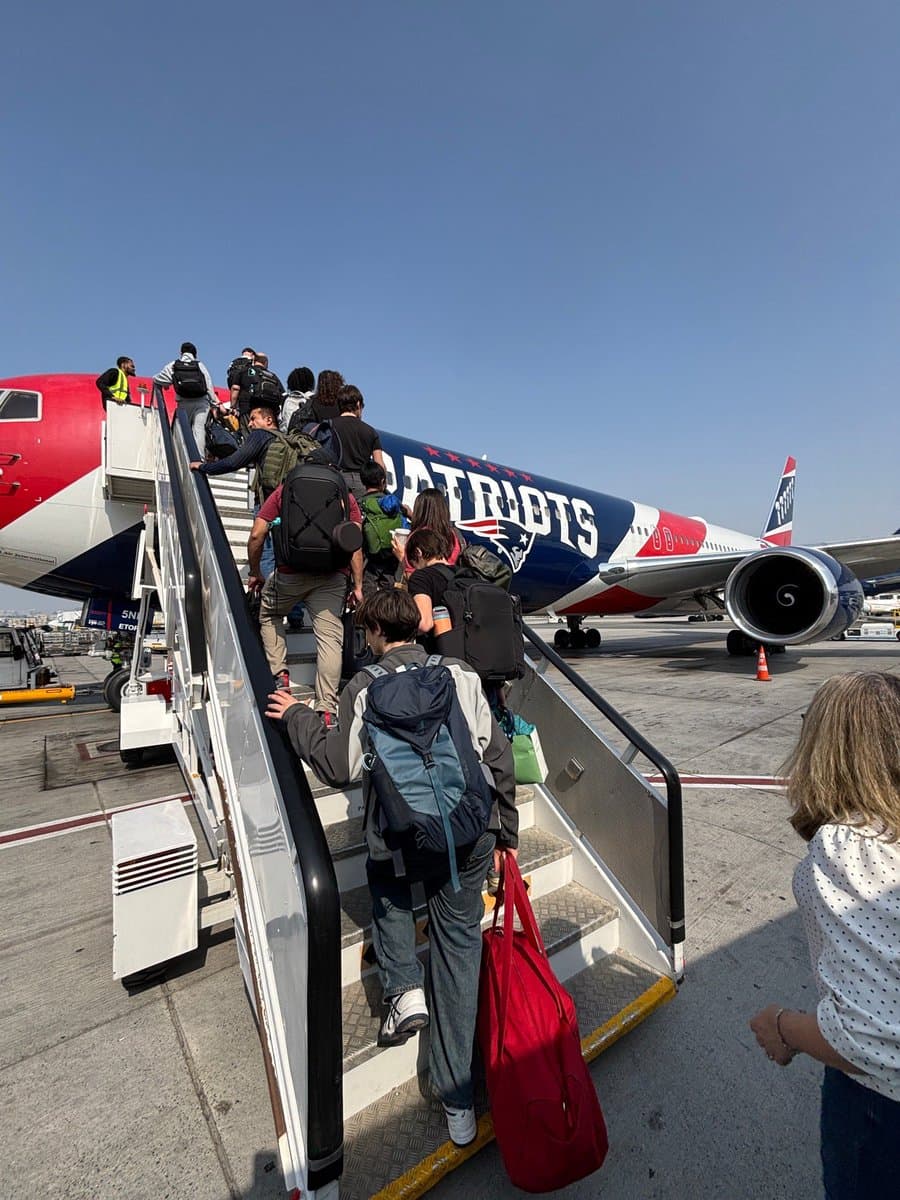 Americans boarding a State Department charter flight heading home from the Middle East.