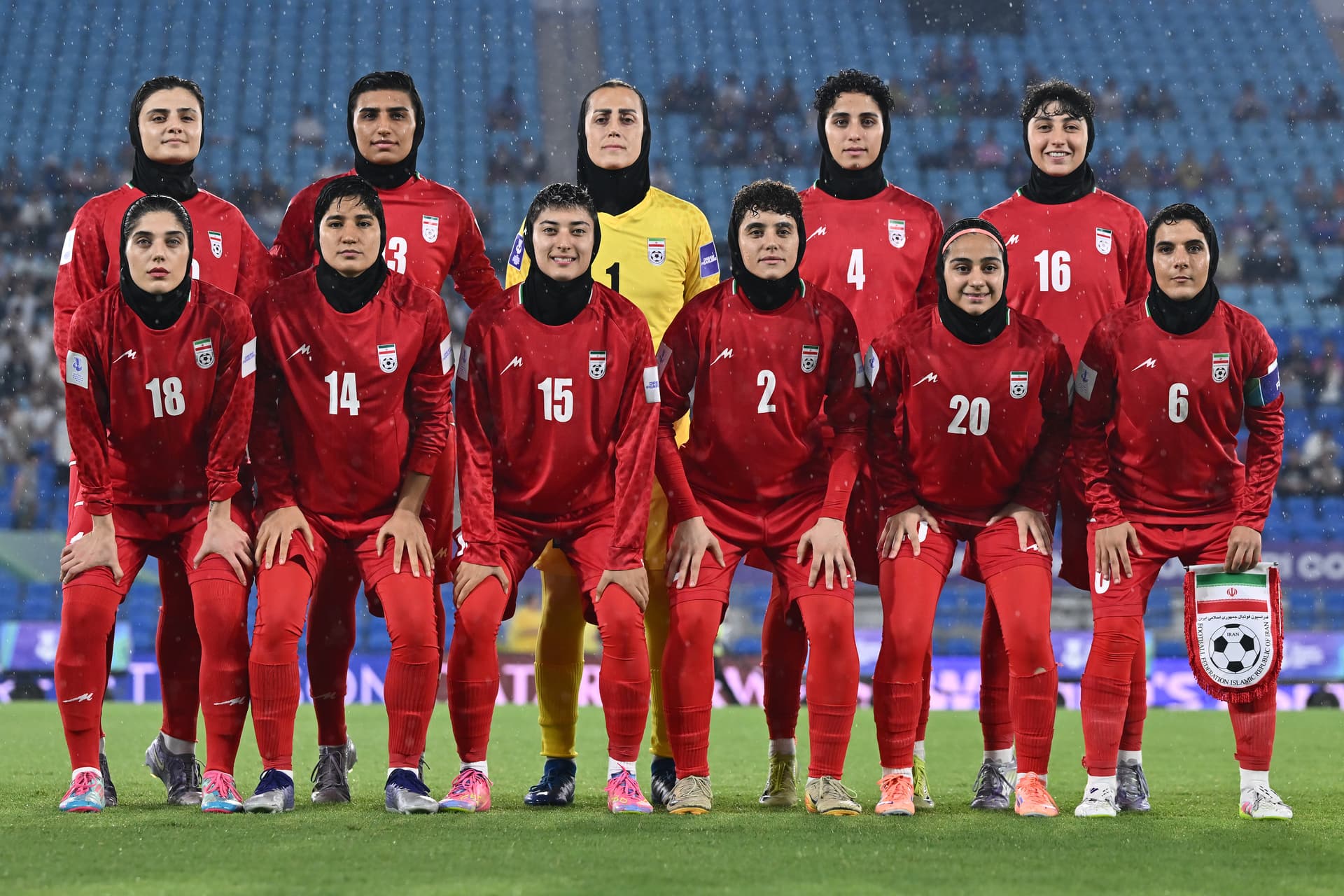 The Iranian women's soccer team pose for a team photo during an AFC Women's Asian Cup Australia 2026 match.