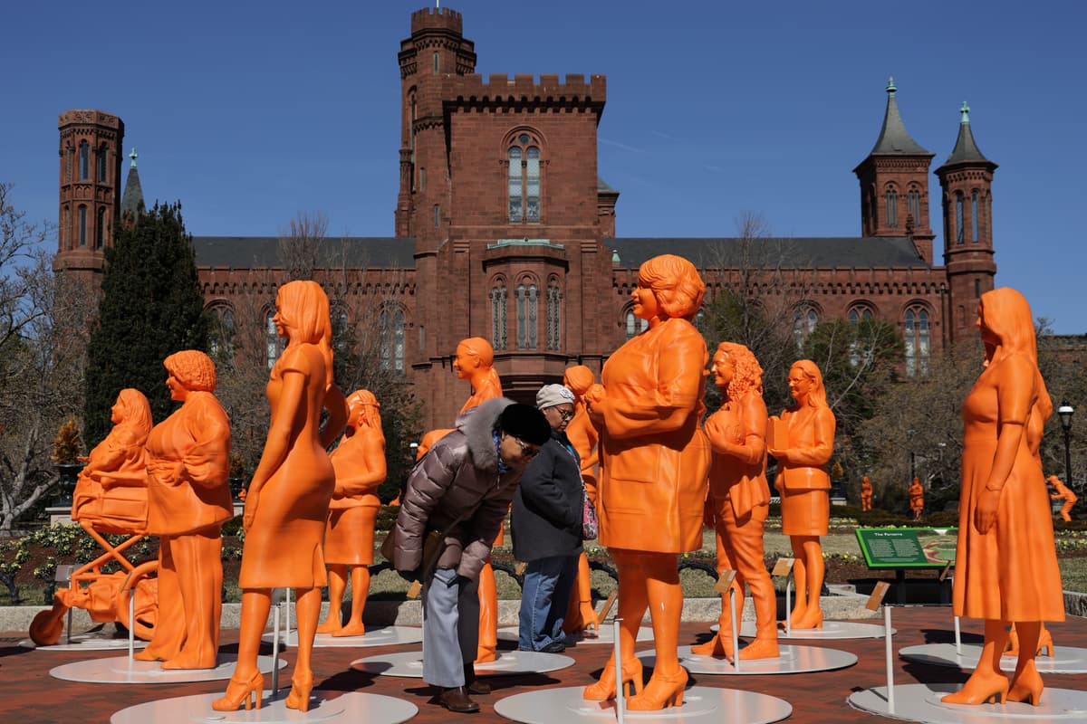 An exhibit honoring women in STEM at the outside the Smithsonian Castle on the National Mall.