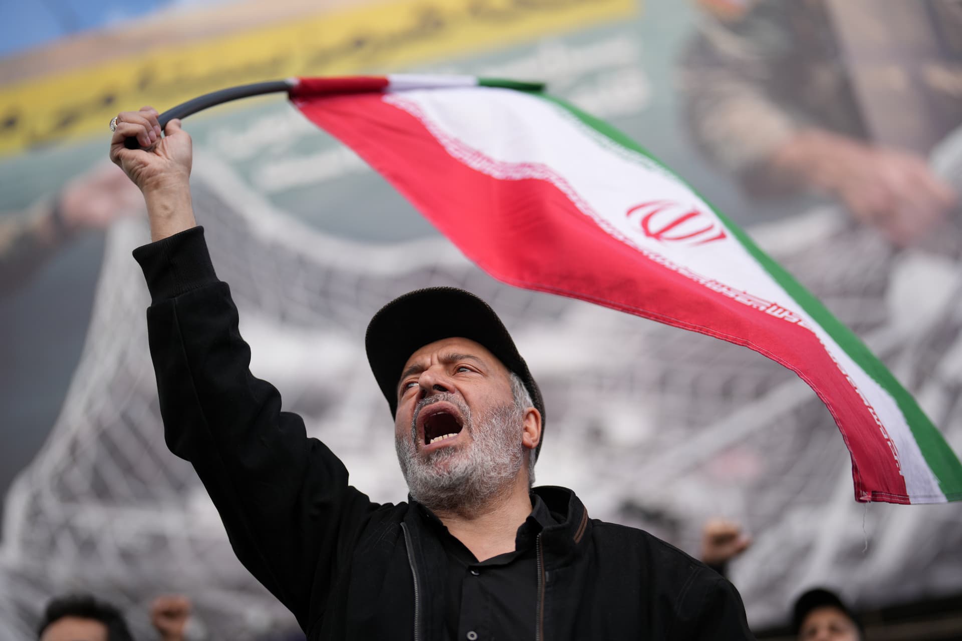 A government supporter at Tehran, April 8, 2026.
