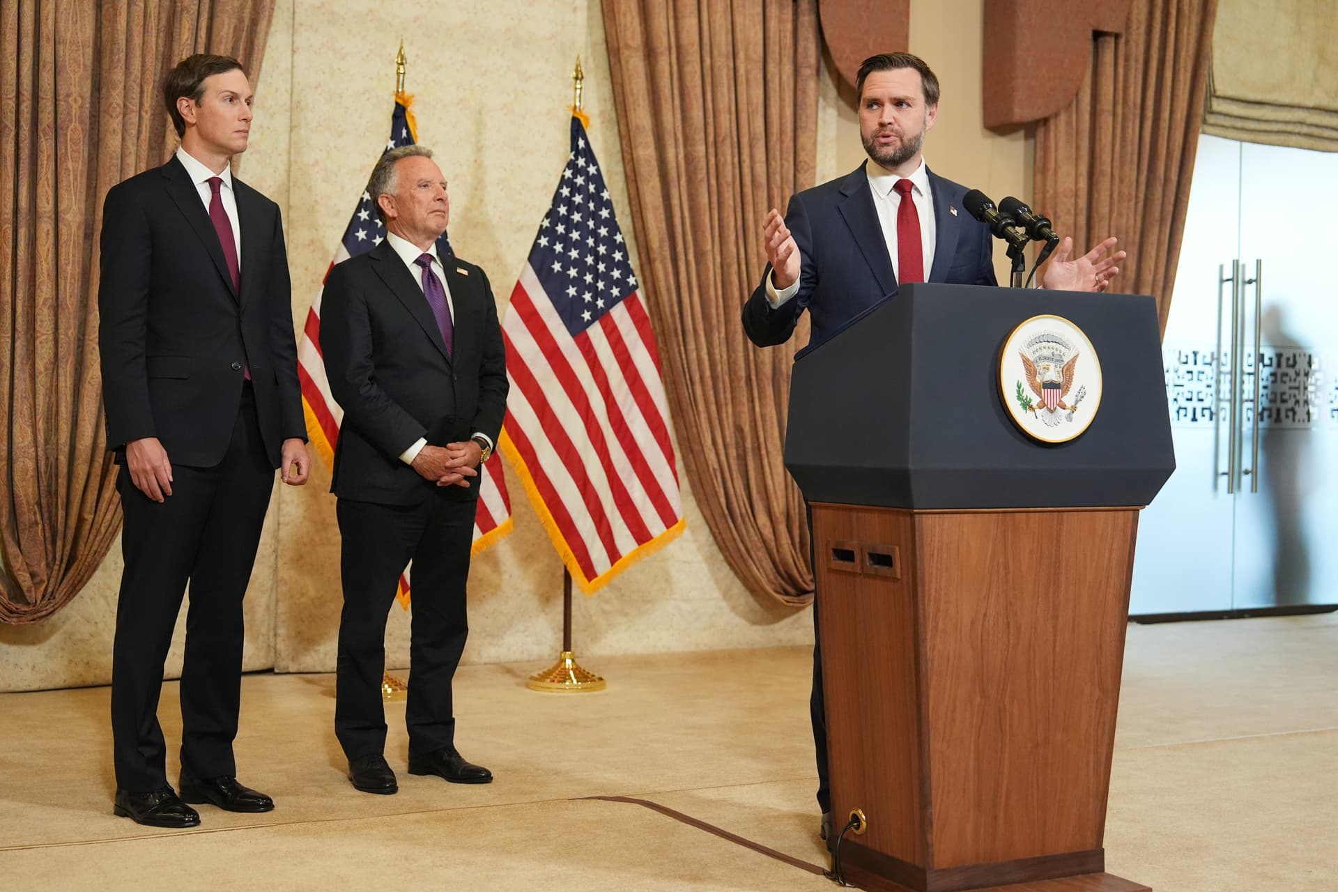 Vice President JD Vance speaks during a news conference after meeting with representatives from Pakistan and Iran as envoys Jared Kushner, left, and Steve Witkoff, listen on April 12, 2026, at Islamabad. 