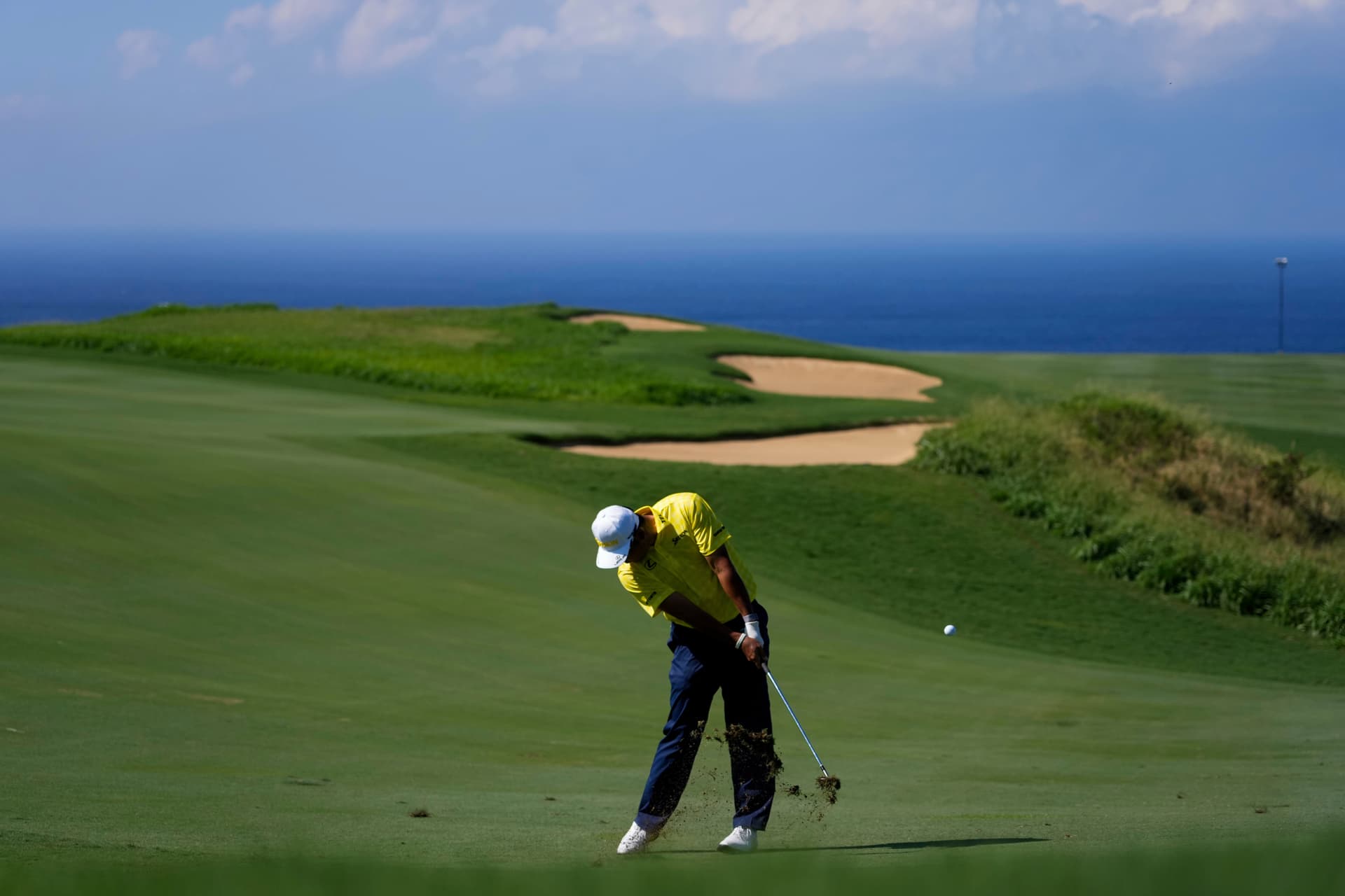 Hideki Matsuyama, of Japan, hits on the 13th hole during the final round of The Sentry golf event, Jan. 5, 2025, at Kapalua Plantation Course, at Kapalua, Hawaii. The PGA Tour is not returning to Hawaii this year amid business model restructuring. 