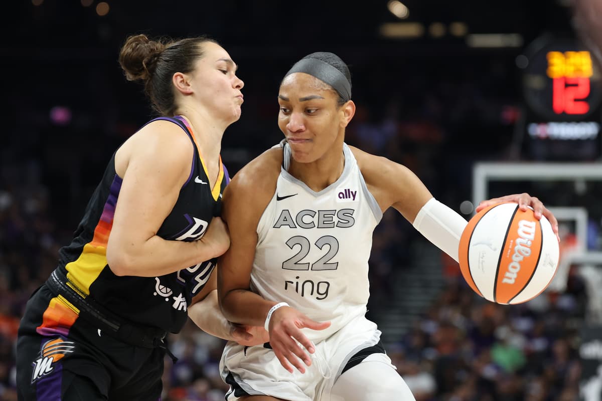 A'ja Wilson of the Las Vegas Aces drives to the basket against Kathryn Westbeld of the Phoenix Mercury during Game Four of the 2025 WNBA playoffs at Phoenix, Arizona, on October 10, 2025.
