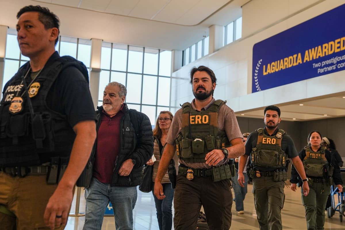 ICE agents walk through LaGuardia Airport while assisting with airline security at New York on March 28, 2026, New York.