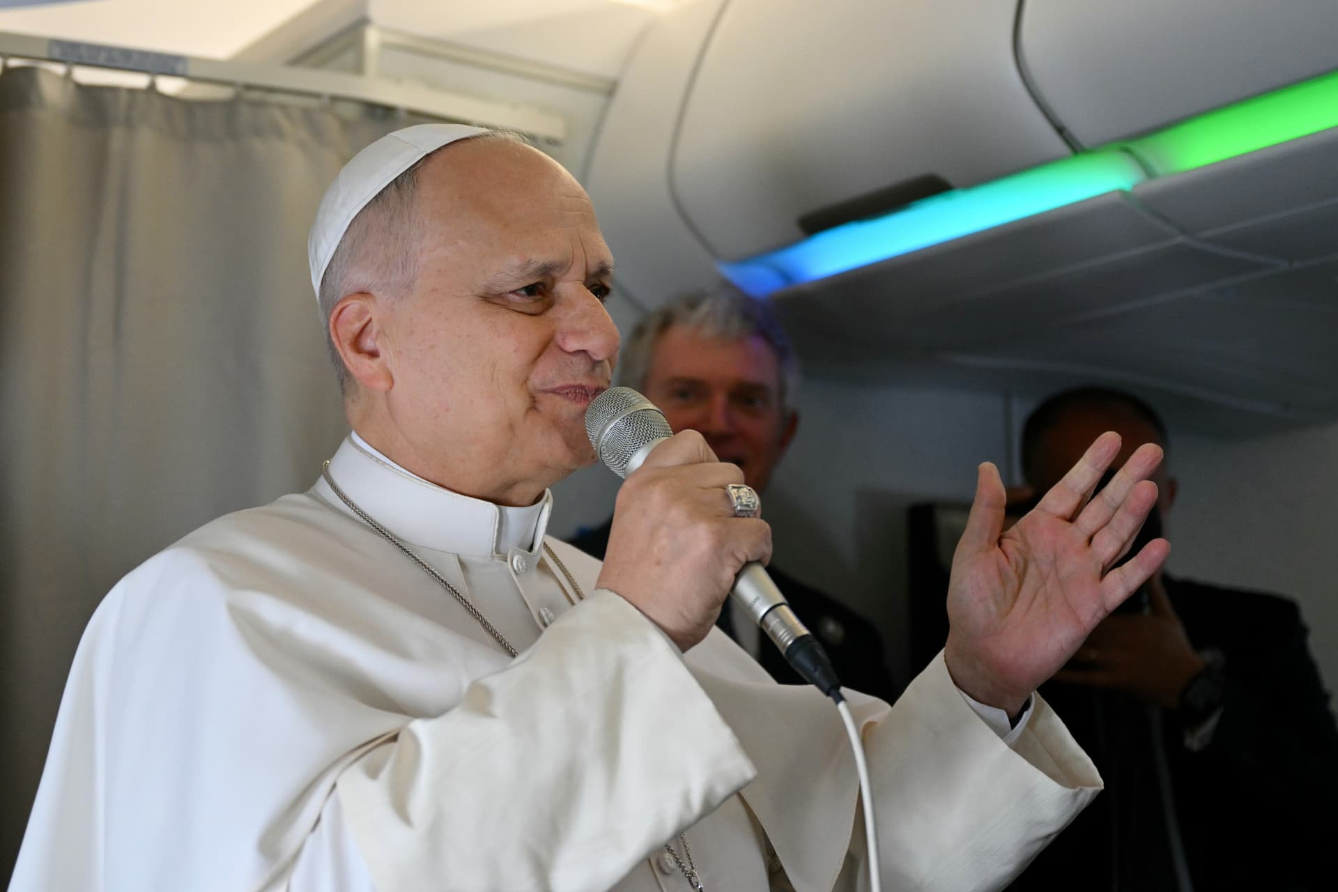Pope Leo XIV speaks to journalists aboard his flight bound for Algiers on April 13, 2026.