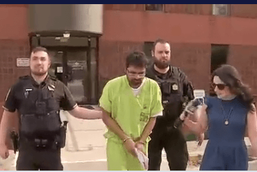 A suspect is escorted from court at Bethel Park, Pennsylvania, on April 2, 2026, after a preliminary hearing on charges that he sexually assaulted a woman in an Easter bunny costume.