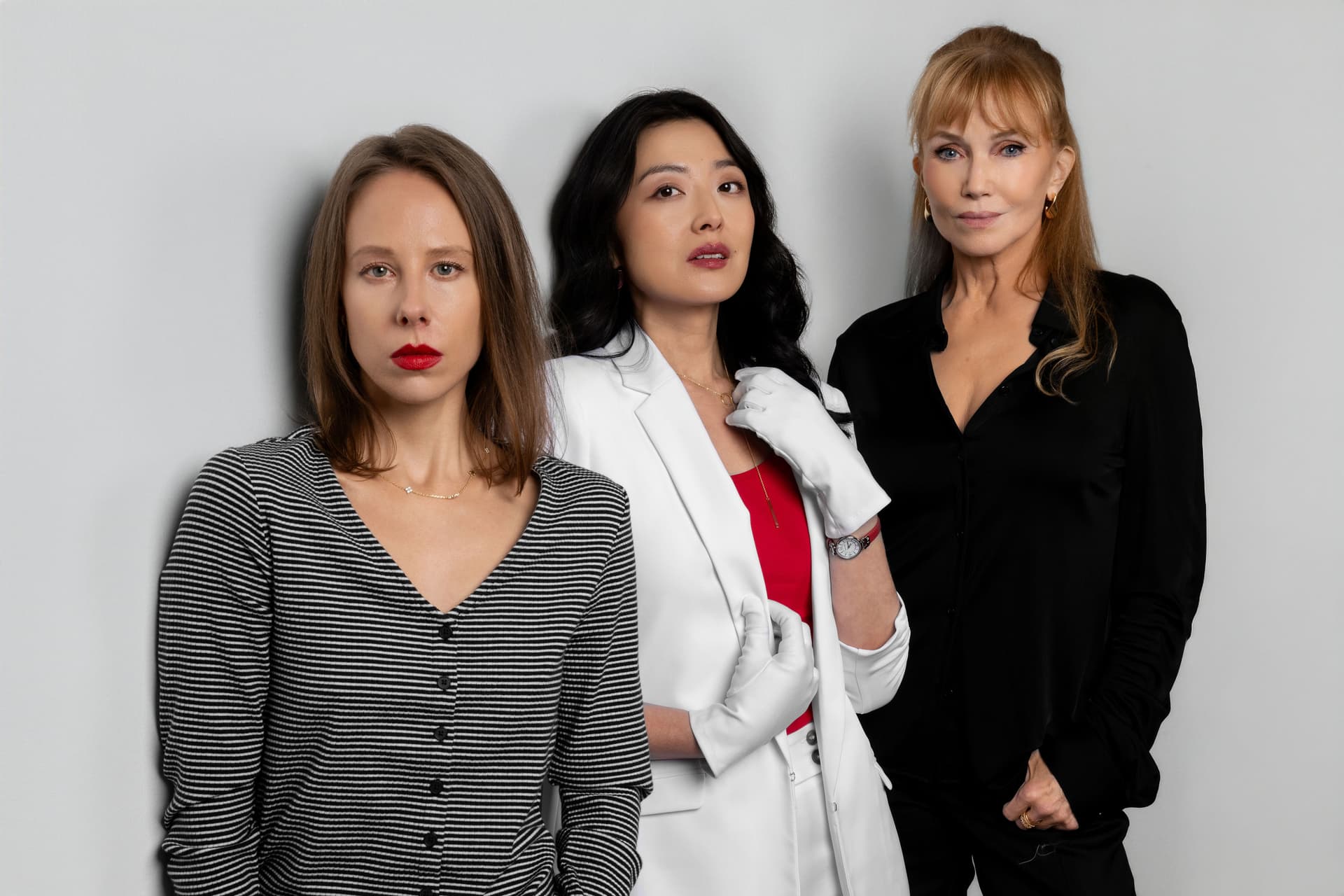 Christina Toth, Di Zhu, and Rebecca De Mornay in 'The Pushover.'