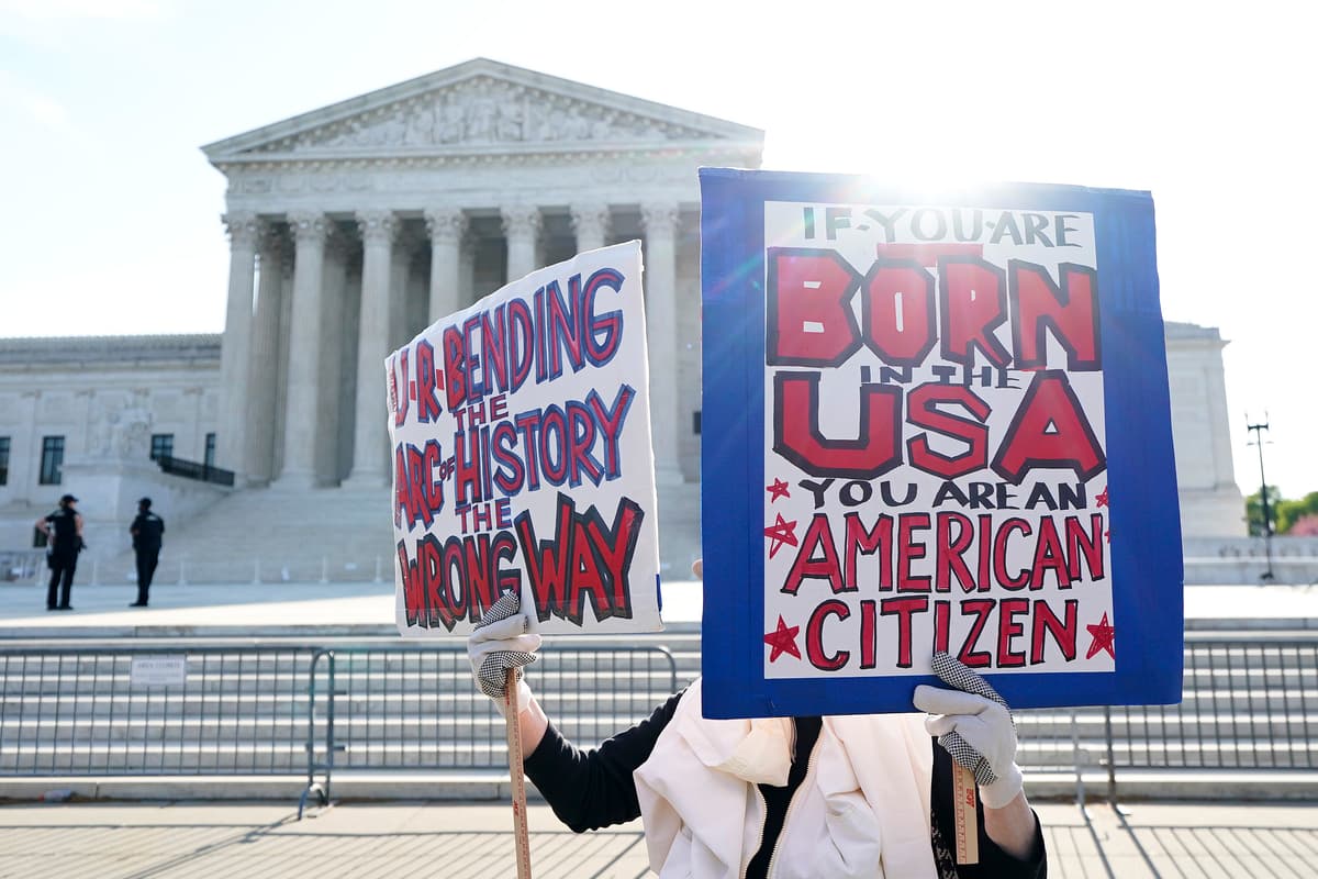 People demonstrate outside the U.S. Supreme Court ahead of President Trump's arrival on April 1, 2026.