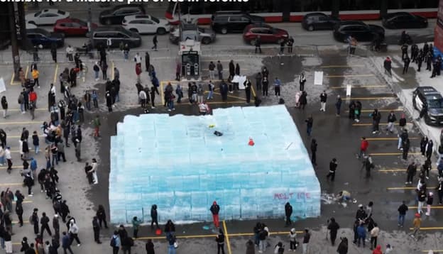 Drake fans were clambering over a promotional stunt ice sculpture and attacked it with pickaxes, sledge hammers and blowtorches. 