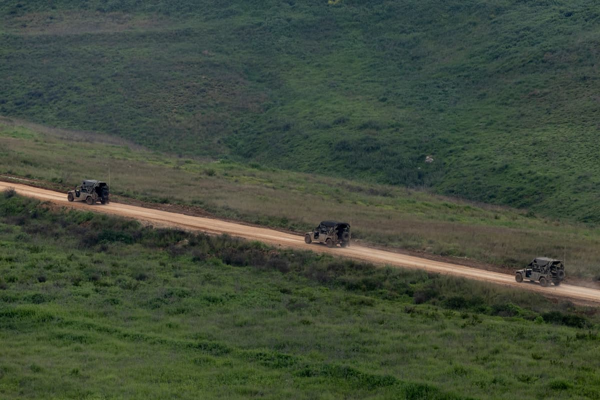 Israel army vehicles move near the border with Lebanon on on April 9, 2026 in Northern Lebanon, Israel.
