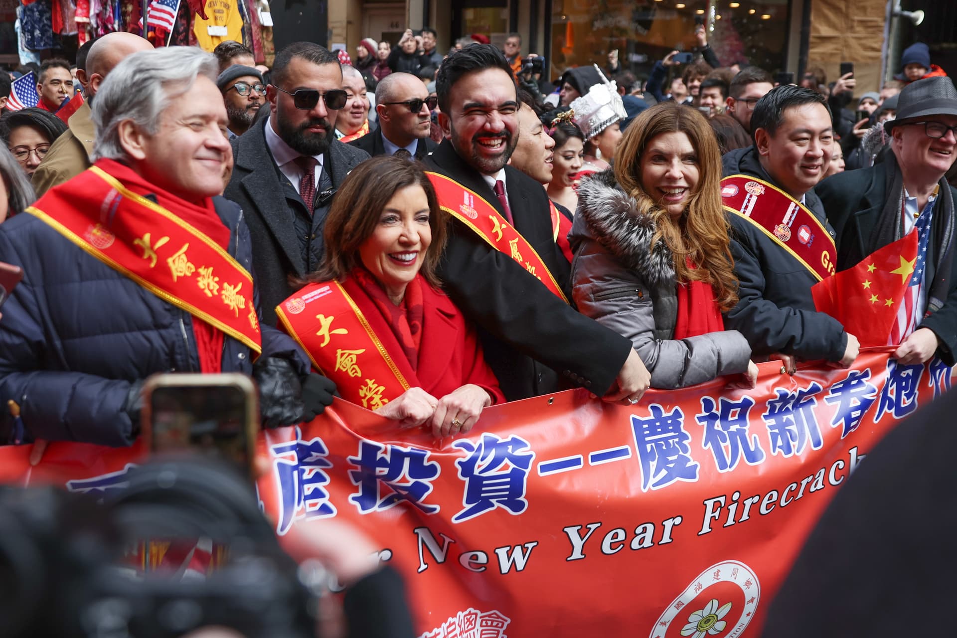 Mayor Zohran Mamdani, center, Governor Kathy Hochul, left, and City Council speaker Julie Menin, right, attend the Chinatown Lunar New Year Parade, March 1, 2026, in New York.