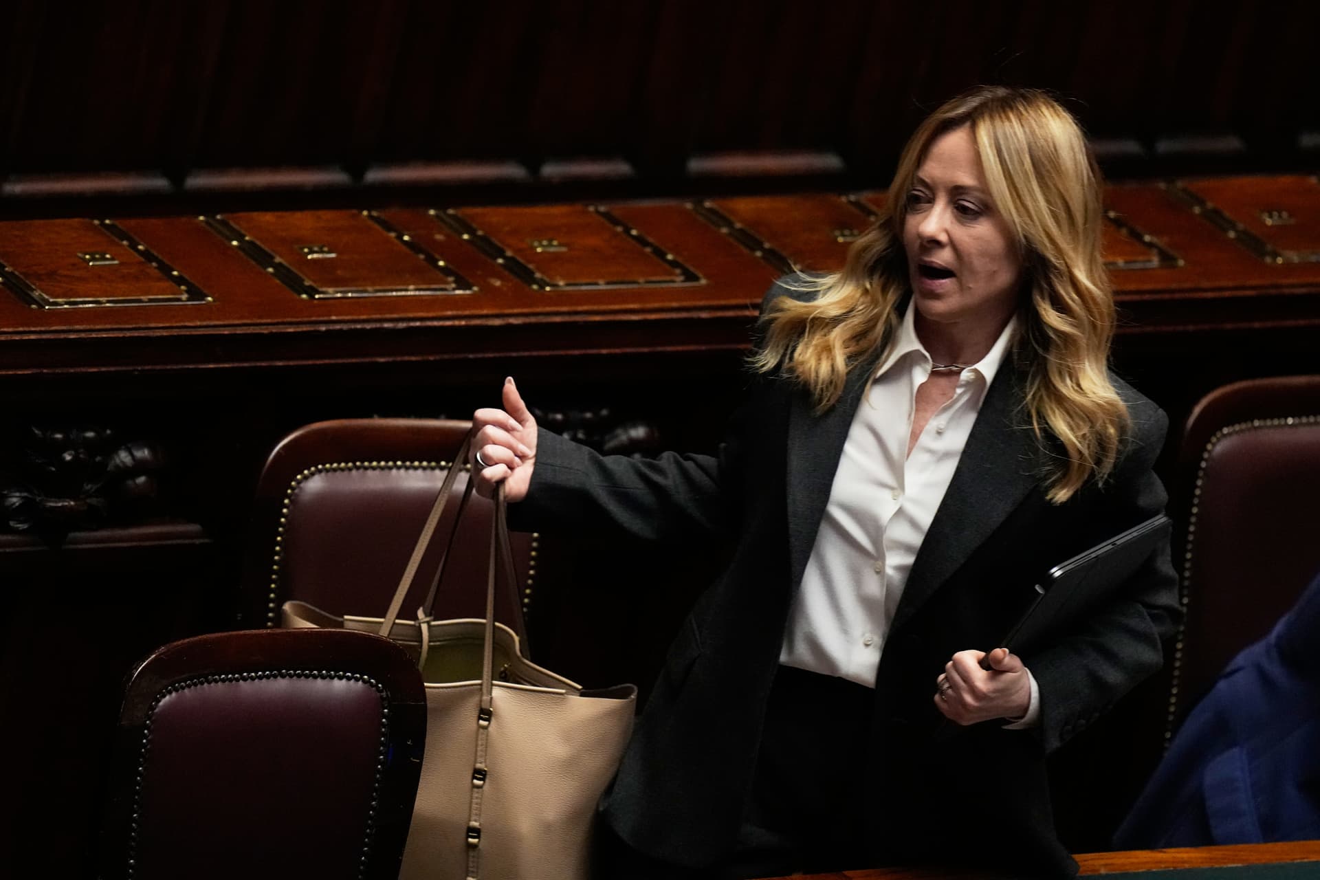 Prime Minister Giorgia Meloni leaves the lower chamber of parliament at Rome, April 9, 2026. 