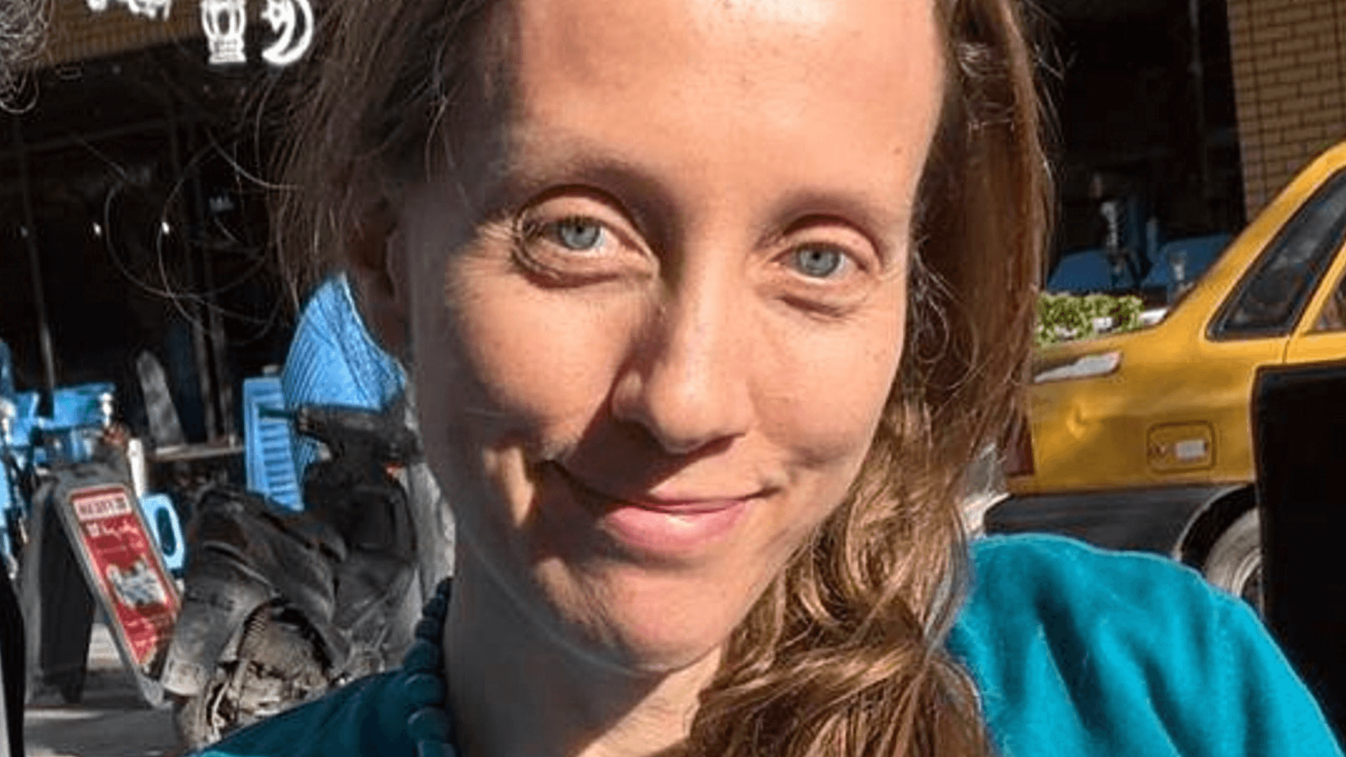 American journalist Shelly Kittleson poses for a cellphone photo in a cafe in Baghdad, Iraq, Monday, March 30, 2026. 