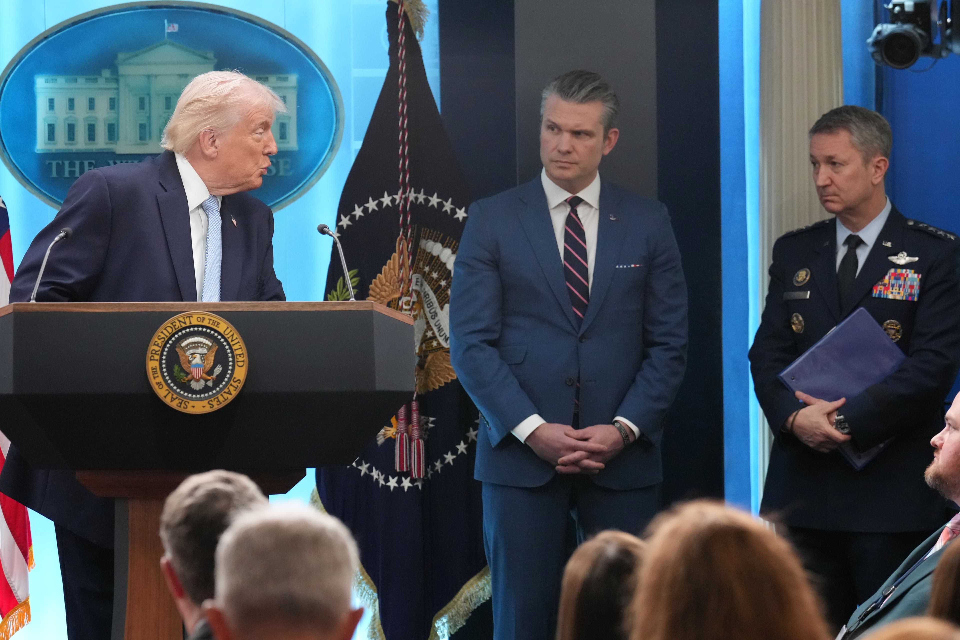 President Trump with Defense Secretary Pete Hegseth and the chairman of the joint chiefs of staff, General Dan Caine, at the White House, April 6, 2026.