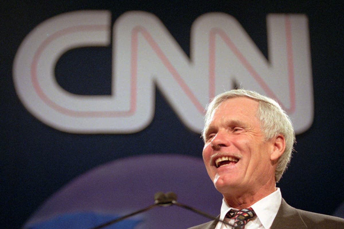 FILE - Sports and media mogul Ted Turner speaks during the CNN World Report Contributors banquet at Atlanta on May 4, 1995. 