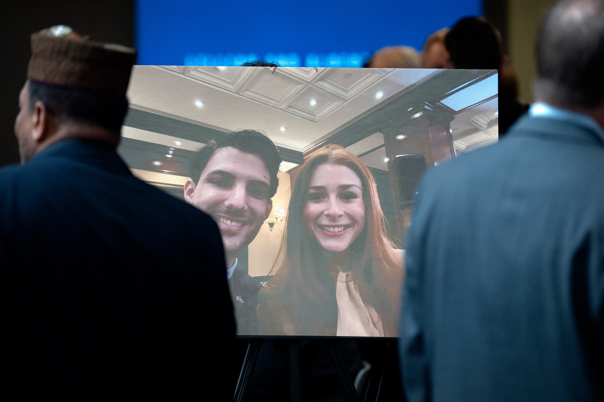 Visitors pass a photo of slain Israeli Embassy staff members Yaron Lischinsky, left, and Sarah Milgrim before a service to mark the reopening of the Capital Jewish Museum at Washington, D.C. on May 29, 2025.